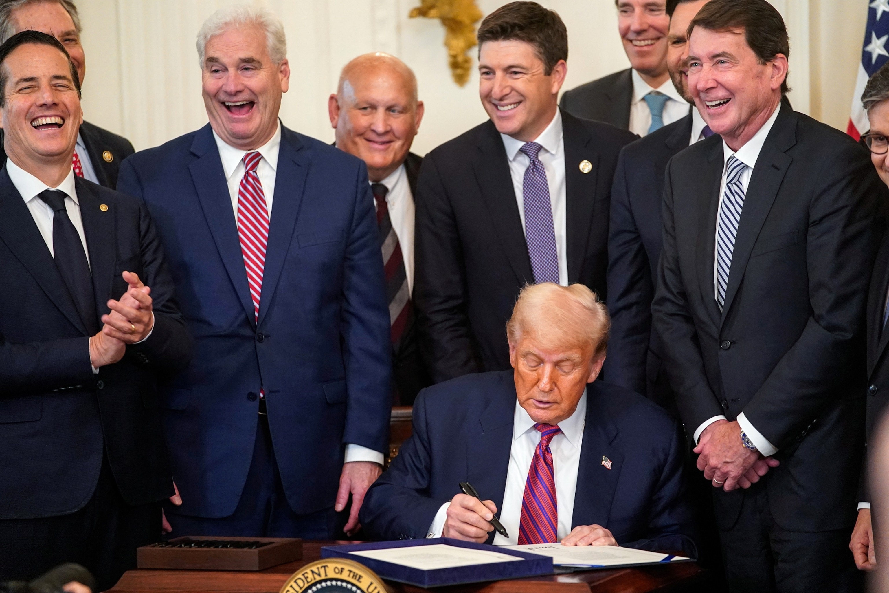 Merchants using modern point-of-sale terminals to accept compliant U.S. stablecoin payments under the GENIUS Act 2025 regulations